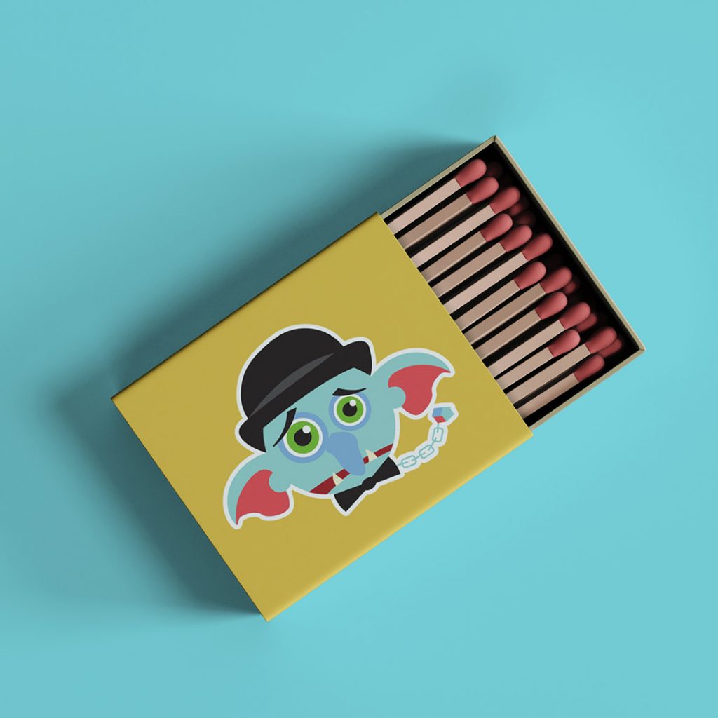 photo of a printed matchbox with silly troll